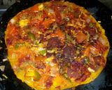 A picture of step 16 of Indian pizza.