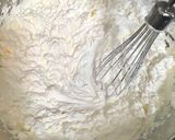A picture of step 2 of Yogurt Ice Cream with Honey and Walnuts.