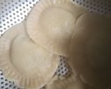 A picture of step 18 of Orange flavour sweet & sour soup with besan ravioli.