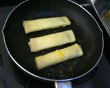 Foto langkah ke 3 dari resep Nutella Roll-ups (roti sisa).