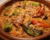 Foto del paso 18 de la receta: Cazuela de arroz, con chuletas de cordero y pimientos fritos