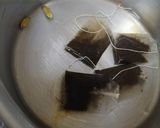 A picture of step 1 of Cardamom Tea☕.