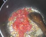 A picture of step 3 of Fried njahi (black beans).