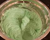 A picture of step 13 of Mint Chococolate Chip Cheesecake with a Fudge Brownie Crust.