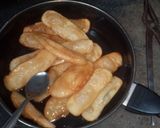 A picture of step 35 of Sugar coat khaja.