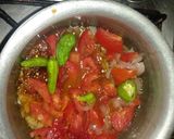 A picture of step 8 of Besni masala prahta with tomato souce.