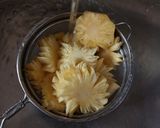 A picture of step 1 of STEWED PINEAPPLE 🍍 RINGS.