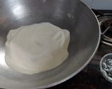 A picture of step 1 of Mango kesari Halwa.