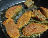 A picture of step 2 of Amritsari fried fish.
