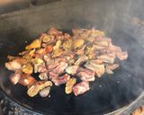 A picture of step 2 of Paella with Vegetables and Meat.