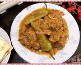 A picture of step 8 of Sanfaz achar gosht masala.