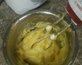 A picture of step 7 of Choco orange eclair with fresh cream...cup of hot chocolate.