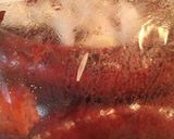 A picture of step 4 of Grilled Sausage and grilled onions.