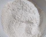 A picture of step 2 of Coconut puff puff.