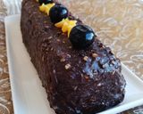 Foto del paso 15 de la receta Plumcake vegano de chocolate relleno de coulis de arándanos y cobertura de ganache chocolate