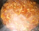 A picture of step 5 of Nigerian rice & greenish sauce.
