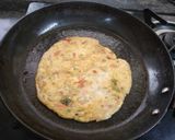 A picture of step 6 of Spicy onion and tomato paratha.