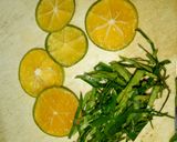 A picture of step 2 of Steamed Snails with Lemongrass and Lime Leaves - Ginger Fish Sauce Dip.