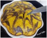 A picture of step 7 of Orange Marble Cake🍊🎂.