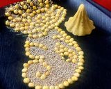 A picture of step 5 of ROSTED CHANA DAL & SESAME SEED LADDU.