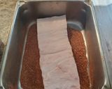 A picture of step 3 of Brad's homemade Cajun bacon.