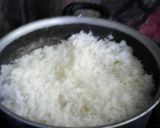Foto del paso 3 de la receta: Arroz capeado con carne y queso