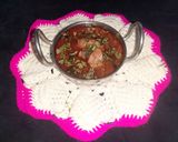 A picture of step 6 of Chicken masala curry.