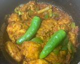 A picture of step 3 of Chicken masala with peas pulao rice.