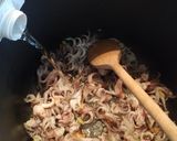 Foto del passaggio 2 della ricetta Polenta con ciuffi di calamaro in umido