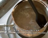 A picture of step 11 of Tiramisu, and Cocoa Sponge with plenty of Coffee Syrup.