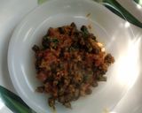 A picture of step 6 of Hara chana masala curry.