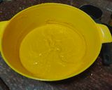 A picture of step 2 of Mango malpua with fresh cream.