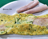Foto del paso 6 de la receta: Rollito de tortilla con calabacín, pavo y queso
