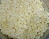 A picture of step 12 of Tikka macroni.