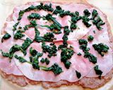 A picture of step 2 of Meat Pinwheels with Ham, Cheese, and Spinach.