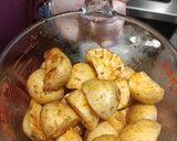 A picture of step 2 of Gammon steaks with garlic and cajun air fryer potatoes.