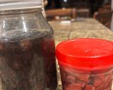 A picture of step 2 of Salted Olives and Pickled Purple Daikon Radish.