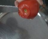 A picture of step 2 of Stuffed Tomato.