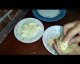 A picture of step 3 of Cheesy chicken potato sticks.