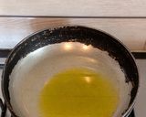 A picture of step 1 of Peyaj Koli Bhaja.
