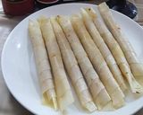 A picture of step 5 of Chicken cigar roll🌯.