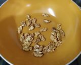 A picture of step 1 of Macaroni Pasta with Walnuts.