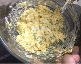 A picture of step 6 of Egg-cheese salad in bread cups.