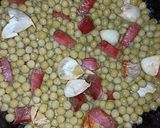 Foto del paso 3 de la receta Guisantes al ajillo con jamón