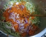 A picture of step 16 of Tumeric rice with sausages, egg curry and salad.