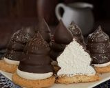 Foto del passaggio 8 della ricetta Moretti - Meringhe al Dulce de Leche e Cioccolato