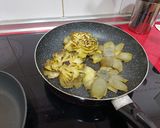 A picture of step 5 of Goat Cheese and Ham Stuffed Artichokes.