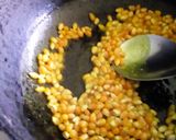 A picture of step 2 of Salty turmeric popcorn.