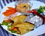 A picture of step 9 of Chicken tikka paratha roll.
