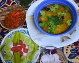 A picture of step 9 of Tasty pumpkin lentils with pickle,salad and chutney.